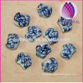 2015 whole sale artificial for DIY jewelry making Bead porcelain white and blue 13X15mm dragon shape 50pcs per bag